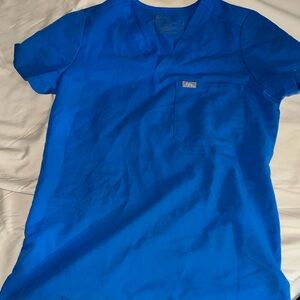 Figs scrub top. Color royal blue. Size small. Great condition.